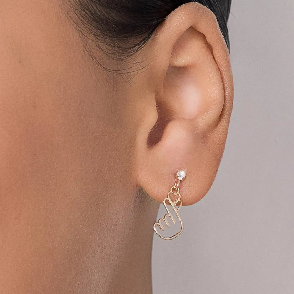 BRINCO CORAÇÃO COREANO FINGER HEART BANHADO A OURO 18K